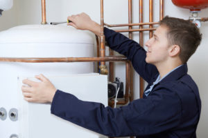 Man fixing boiler